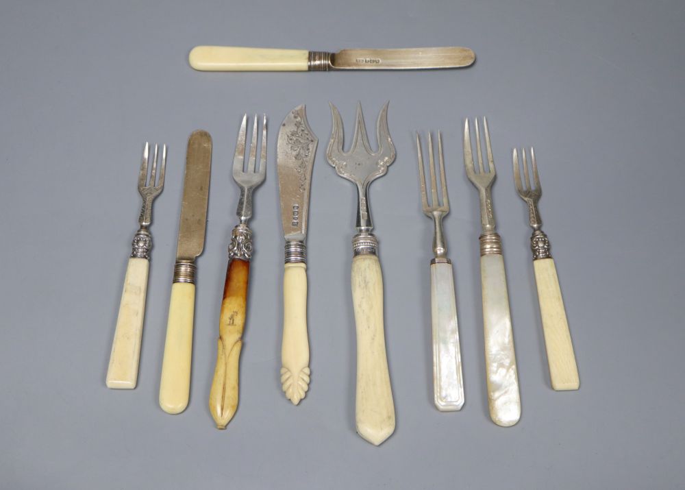 Nine assorted 19th century and later ivory handled silver knives and forks.